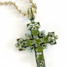 Gold necklace cross with green crystals pendant on chain