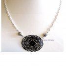 Silver necklace with lasercut black