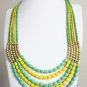 Green yellow and gold statement necklace