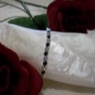 Stretchy Bracelet w/clear and black crystals 7"