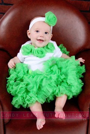 HARLEQUIN GREEN | rosette onesie