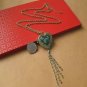 Heart-shaped treasure box necklace peacock feathers