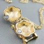 Cinderella's pumpkin car necklace