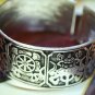 Tibetan Silver 'eight auspicious symbols' Bangle