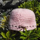 Pink Crocheted Hat with Brown Ribbon Bow