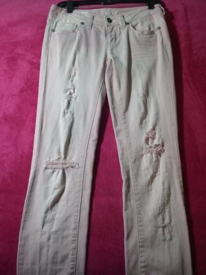 Light Pink Distressed Skinny Jeans