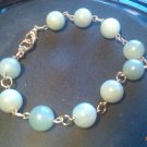 10mm Round Jade and Gold accent Bracelet