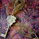 On Key: Vintage-inspired Golden Filigree Key Pendant Ribbon Necklace