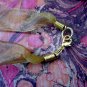 On Key: Vintage-inspired Golden Filigree Key Pendant Ribbon Necklace