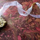 On Key: Vintage-inspired Gold Filigree Medallion White Ribbon Necklace