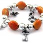 Vogue Oval Glass Bead Silver plate Stretch Dangle