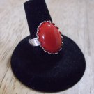 Red cabochon silver color metal sizeable ring we also have dif colors