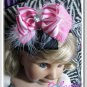 F206c Pink zebra feather 6inch boutique bow