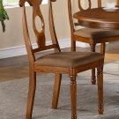 Set of 4 Napoleon style back dining room chairs seat in Saddle Brown finish.