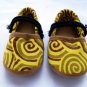 Funky colourful childrens shoes for boys or girls. Yellow and brown. Baby toddler small size