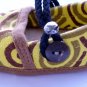 Funky colourful childrens shoes for boys or girls. Yellow and brown. Baby toddler small size