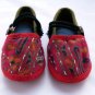 Funky and colourful childrens shoes for boys or girls. Green red blue black. Baby toddler small size