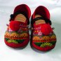 Funky colourful children's shoes for both boys or girls. Red and orange. Toddler large size