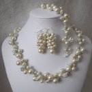 Set of bridal jewelry with earrings, necklace, and bracelet