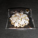 silver/gold pin/brooch