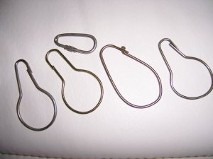 Set Of 5 Assorted Sized Hangers Towels Etc.