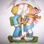 Hummel Boy & Girl Sitting Under Umbrella Wall Hanger BNK2655