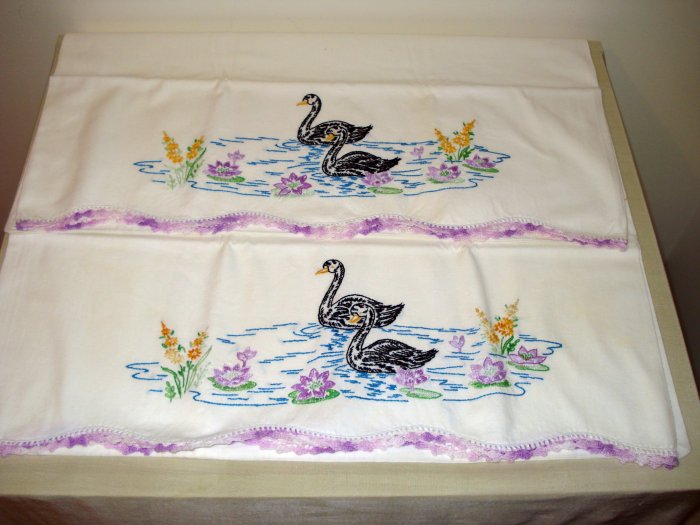 Pair embroidered pillowcases black swans crochet edge vintage hc1971