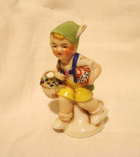 Tirol boy in lederhosen flower basket German porcelain figurine near ...