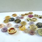 Lot of 28 mixed plastic buttons neutrals 2 and 4 hole vintage hc2968