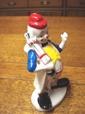 Flambro cold painted clown figurine red hat and umbrella porcelain vintage hc3275