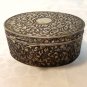 Repousse steel box hinged lid oval silvered interior hc3356