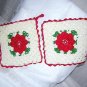 2 Hand crocheted potholders Irish style with red rose centers vintage hc1467