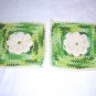 Pair of hand crocheted potholders with rose centers and hanging loops hc1313
