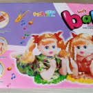 VINTAGE GIRL BABY DOLL ROCKING TO MUSIC