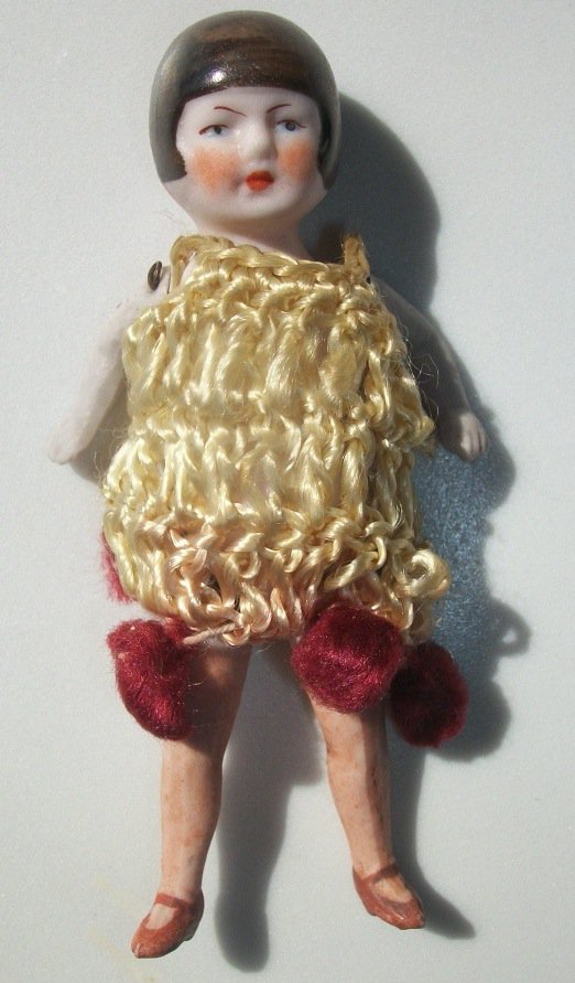 Vintage 4" Porcelain Germany Doll w/ Clothes