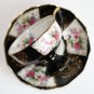 Vintage Porcelain Cup and Saucer, black with flowers