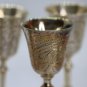 A set of four English EPNS shot glasses, late 19th century
