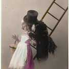 A BOY AND A GIRL, ANTIQUE 1920'S TINTED POSTCARD WITH LETTER