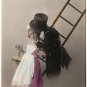 A BOY AND A GIRL, ANTIQUE 1920'S TINTED POSTCARD WITH LETTER