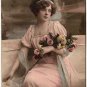 A YOUNG WOMAN WITH ROSES, ANTIQUE 1920'S TINTED POSTCARD WITH LETTER