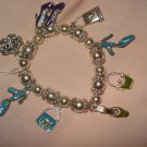 Silver stretch bracelet with enameled purse & shoe charms - eg23