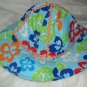 Baby / toddler hat in blue with multi-colored flowers - ekho1c