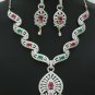 An elegant cubic zirconia necklace and earring set with Ruby and Emerald stones