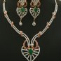 An elegant cubic zirconia necklace and earring set with Emerald stones and Clear crystals