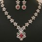 Star designed cubic zirconia necklace and earring set with Ruby stones and Clear crystals