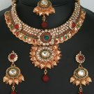 Emerald,ruby and white color stones elegant polki bridal jewelry set in golden background