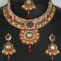 Emerald,ruby and white color stones elegant polki bridal jewelry set in golden background