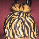 Zebra like drawstring mini purse
