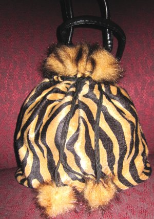 Zebra like drawstring mini purse