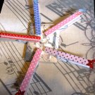 Set of 5 decorated pegs with tag